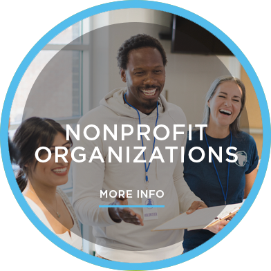 Team of diverse individuals working together at office with copy: Nonprofit Organizations