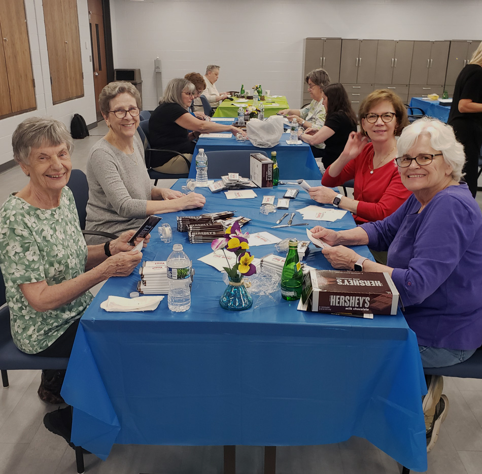 Volunteers sorting packages